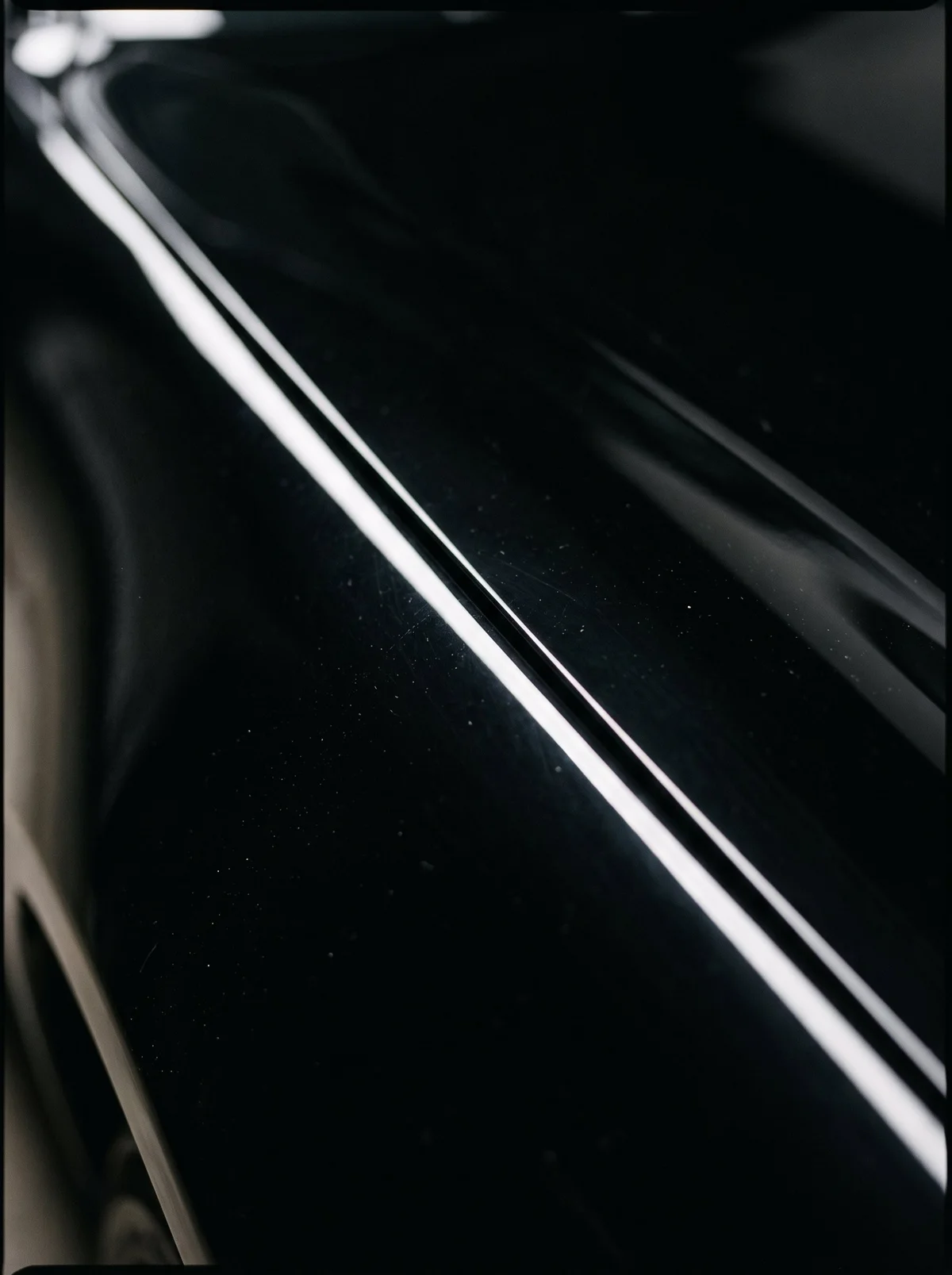 Glossy black panel reflections
